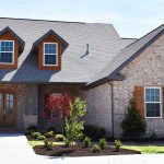 custom home exterior with landscaping